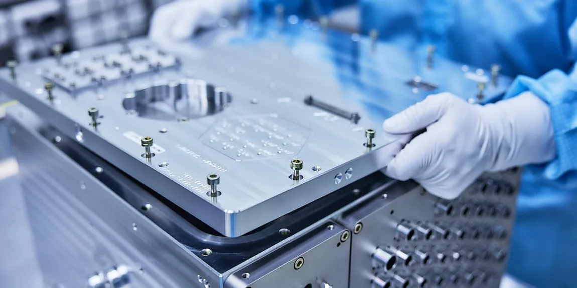 Glass to metal bonded feedthrough assembly